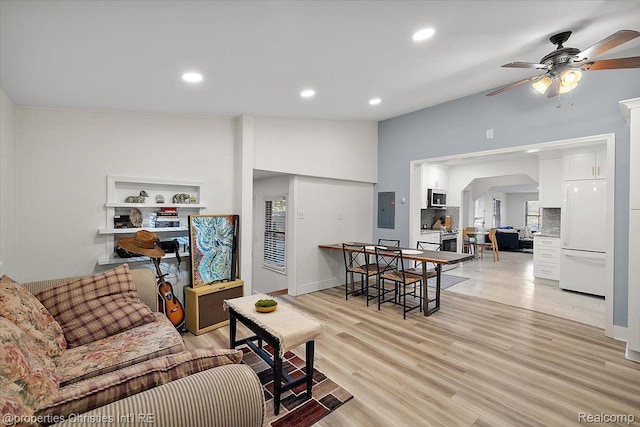 2231 N St, Milford, MI 48380 - living room featuring electric panel, ceiling fan, light wood finished floors, and recessed lighting