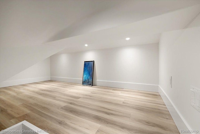 2231 N St, Milford, MI 48380 - additional living space featuring light wood-style flooring, lofted ceiling, and recessed lighting