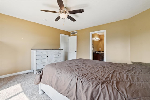 14704 Crescent Meadows Dr, Cedar Springs, MI 49319 - bedroom with carpet floors, ensuite bath, and ceiling fan