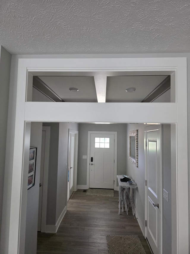 3076 Brayridge Dr, Jenison, MI 49428 - foyer with dark wood-style floors and a textured ceiling