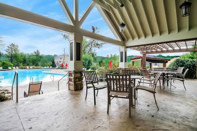 3076 Brayridge Dr, Jenison, MI 49428 - view of patio / terrace featuring a community pool and a pergola