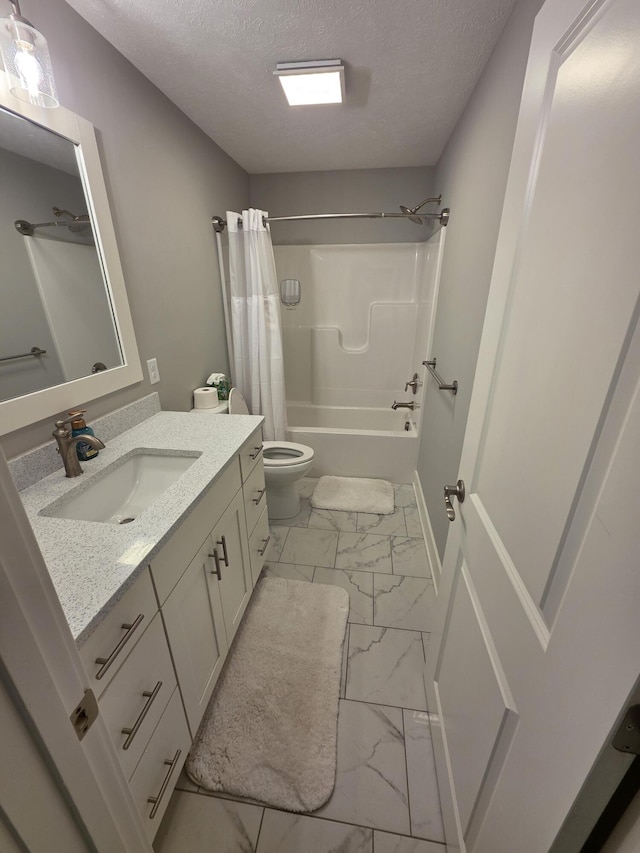 3076 Brayridge Dr, Jenison, MI 49428 - full bathroom with marble look tiles, vanity, shower / bath combo, and a textured ceiling