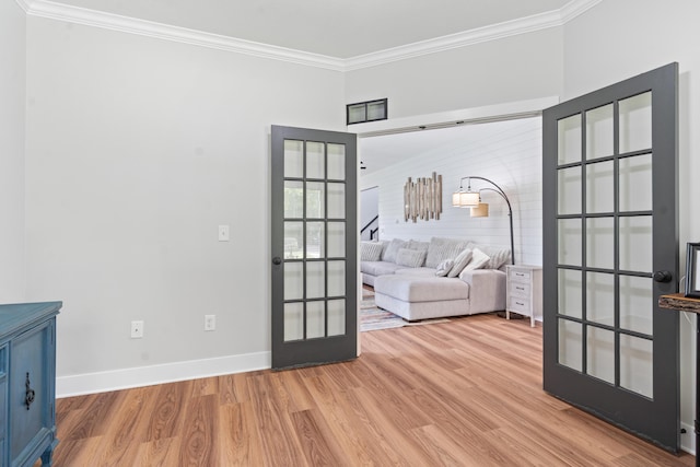 14846 Portage Rd, Vicksburg, MI 49097 - entryway featuring ornamental molding, wood finished floors, stairway, and french doors