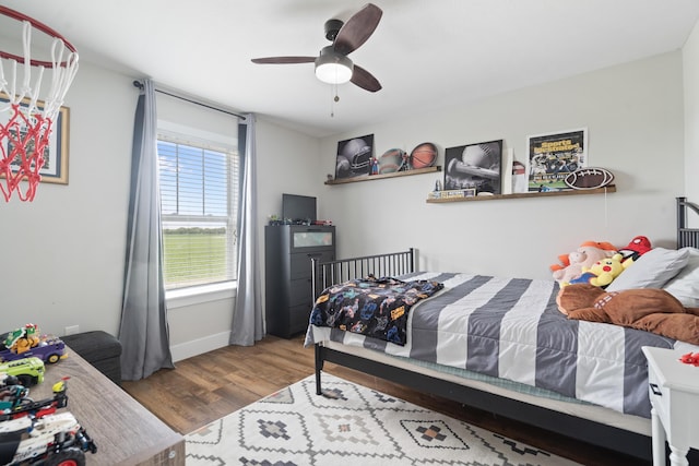 14846 Portage Rd, Vicksburg, MI 49097 - bedroom featuring wood finished floors and ceiling fan