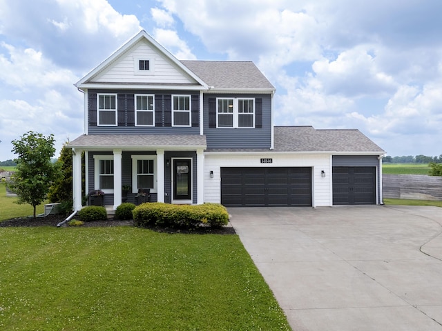14846 Portage Rd, Vicksburg, MI 49097 - view of front of house featuring driveway, a front lawn, a porch, an attached garage, and roof with shingles
