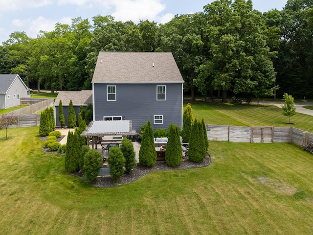 14846 Portage Rd, Vicksburg, MI 49097 - rear view of house featuring a fenced backyard and a patio area