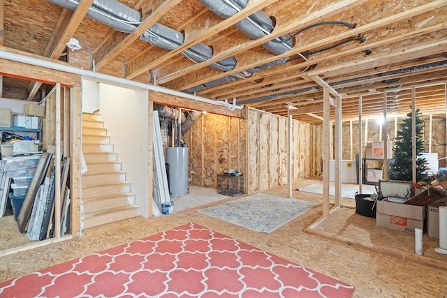 14846 Portage Rd, Vicksburg, MI 49097 - unfinished below grade area featuring gas water heater and stairway