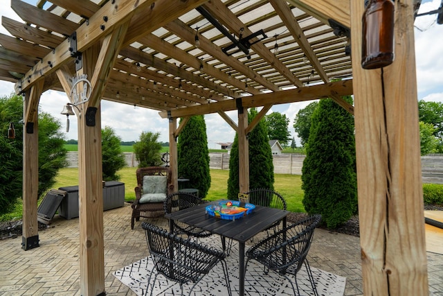 14846 Portage Rd, Vicksburg, MI 49097 - view of patio featuring a pergola and outdoor dining space