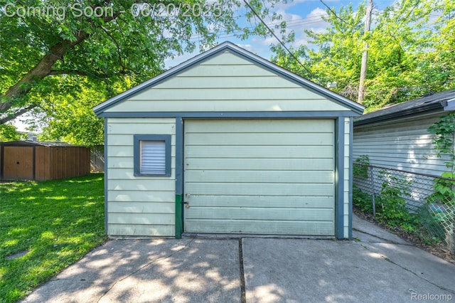 22410 Glen Ct, Saint Clair Shores, MI 48080 - detached garage featuring driveway
