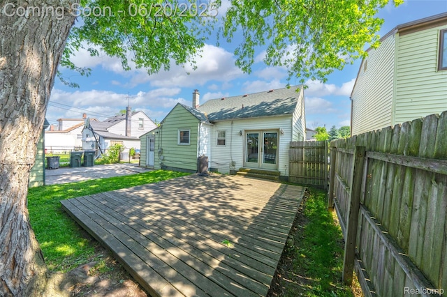 22410 Glen Ct, Saint Clair Shores, MI 48080 - back of property with a fenced backyard, french doors, a wooden deck, and a patio