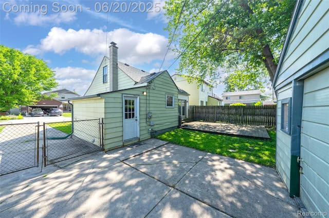 22410 Glen Ct, Saint Clair Shores, MI 48080 - view of patio / terrace with a gate