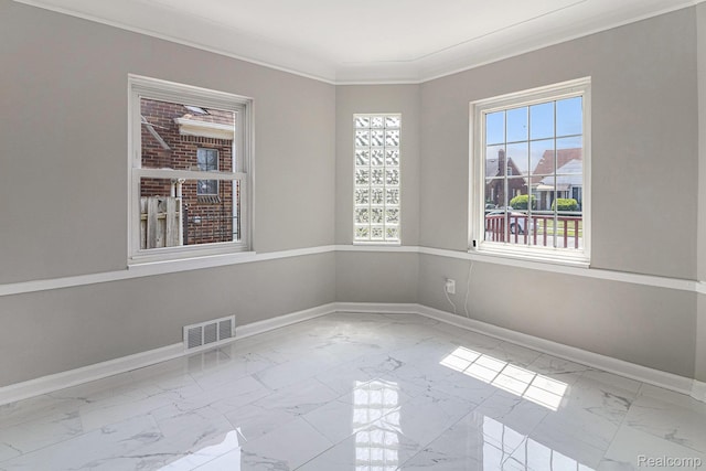 5766 Nottingham Rd, Detroit, MI 48224 - spare room with healthy amount of natural light, marble look tiles, and ornamental molding