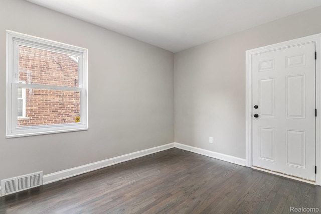 5766 Nottingham Rd, Detroit, MI 48224 - spare room featuring dark wood finished floors and baseboards