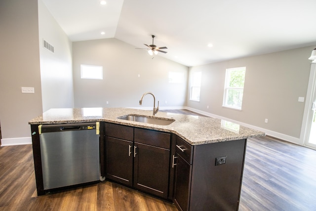 11449 Hidden Oaks Dr, Clio, MI 48420 - kitchen with dishwasher, ceiling fan, light stone counters, vaulted ceiling, and dark wood-type flooring