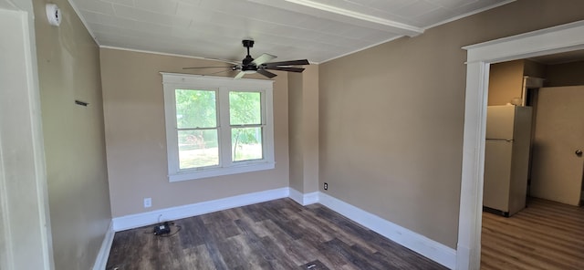 2524 8th St, Muskegon, MI 49444 - spare room featuring dark wood-style flooring, ceiling fan, beam ceiling, crown molding, and a smoke detector