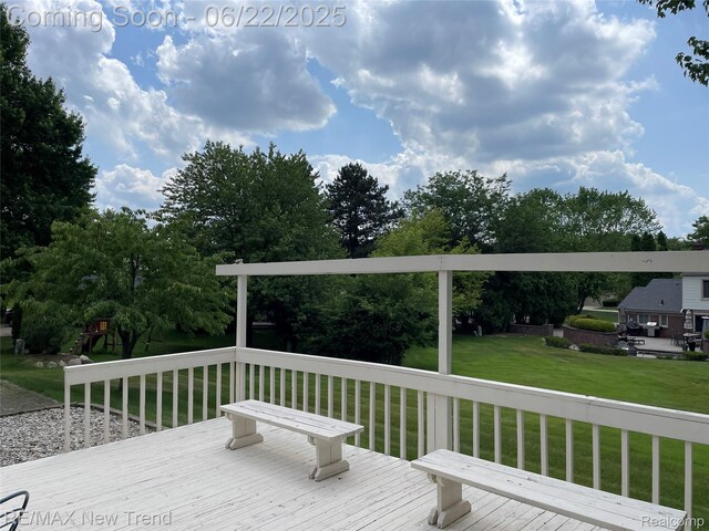 5408 Vincennes Dr, Bloomfield Hills, MI 48302 - deck with a yard and view of wooded area
