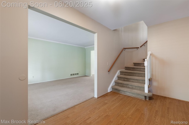 683 Thurber Dr, Troy, MI 48085 - stairs featuring wood finished floors