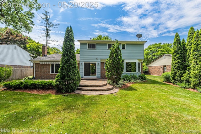 683 Thurber Dr, Troy, MI 48085 - back of house with brick siding and a deck