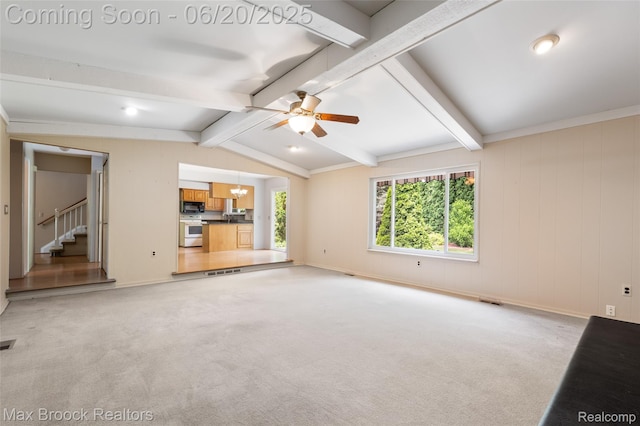 683 Thurber Dr, Troy, MI 48085 - unfurnished living room with stairs, a ceiling fan, light carpet, and a chandelier