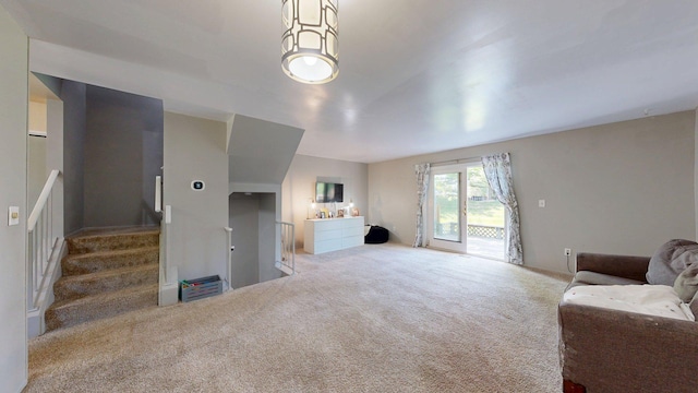 3126 Bolgos Cir, Ann Arbor, MI 48105 - carpeted living area with stairs