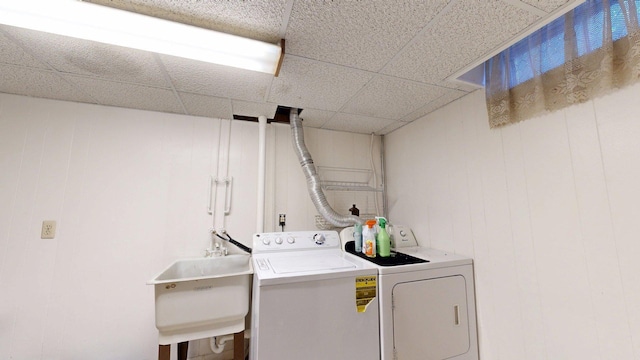 3126 Bolgos Cir, Ann Arbor, MI 48105 - laundry room featuring washer and clothes dryer and a sink