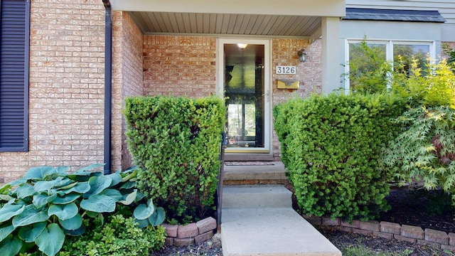 3126 Bolgos Cir, Ann Arbor, MI 48105 - view of exterior entry featuring brick siding