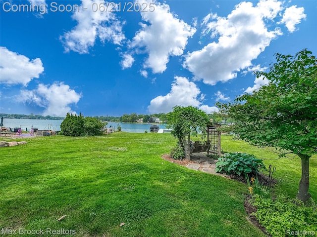 6510 Commerce Rd, West Bloomfield, MI 48324 - view of grassy yard featuring a water view