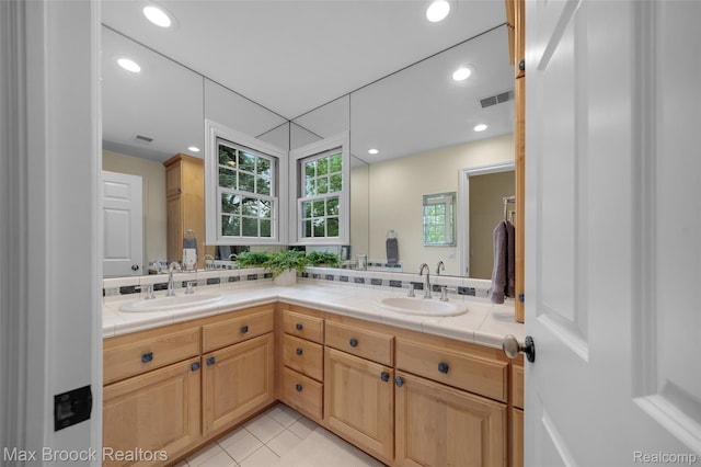 6510 Commerce Rd, West Bloomfield, MI 48324 - bathroom featuring double vanity, recessed lighting, and tile patterned floors