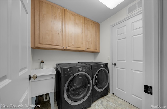 6510 Commerce Rd, West Bloomfield, MI 48324 - washroom featuring washer and clothes dryer and cabinet space