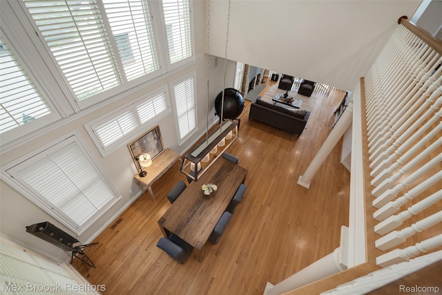 6510 Commerce Rd, West Bloomfield, MI 48324 - living area with wood finished floors and a high ceiling