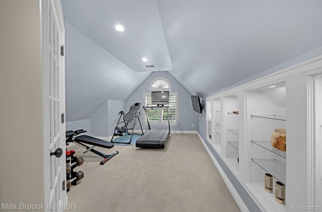 6510 Commerce Rd, West Bloomfield, MI 48324 - workout area with light colored carpet, vaulted ceiling, and built in shelves