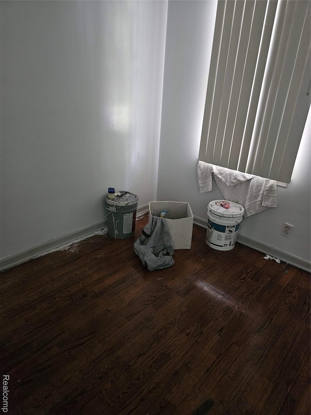 6010 Marja St, Flint, MI 48505 - spare room with wood finished floors and baseboards