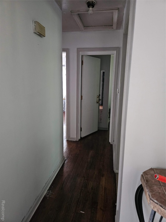 6010 Marja St, Flint, MI 48505 - hallway featuring attic access and dark wood-style flooring