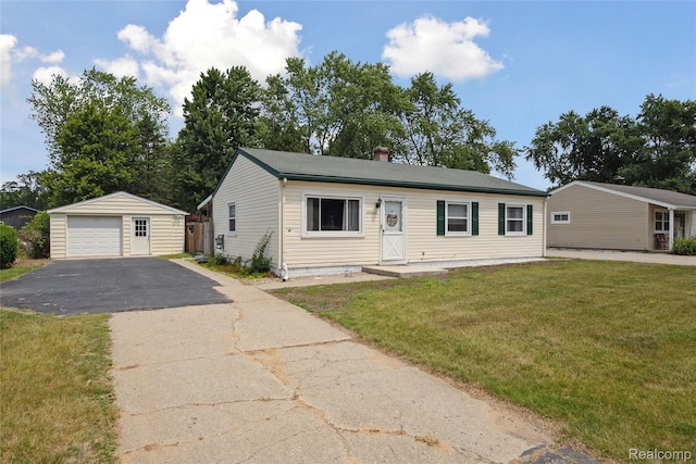 39248 Wade Rd, Taylor, MI 48174 - view of front of home with an outdoor structure, a garage, driveway, and a front yard