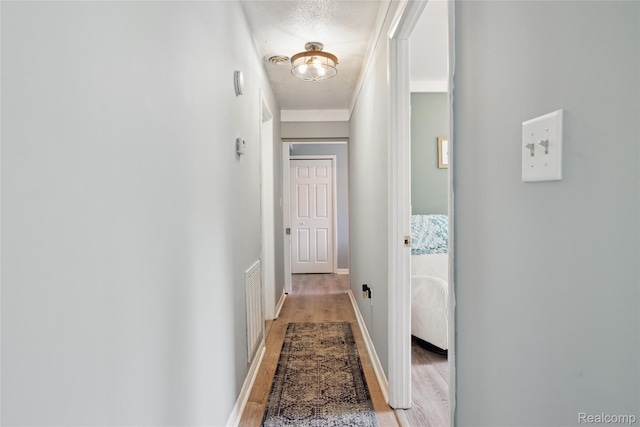 39248 Wade Rd, Taylor, MI 48174 - corridor with light wood-style flooring and baseboards