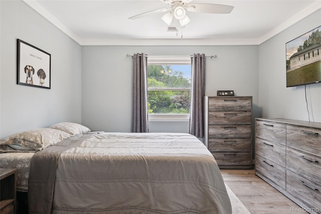 39248 Wade Rd, Taylor, MI 48174 - bedroom with light wood-style flooring and ceiling fan