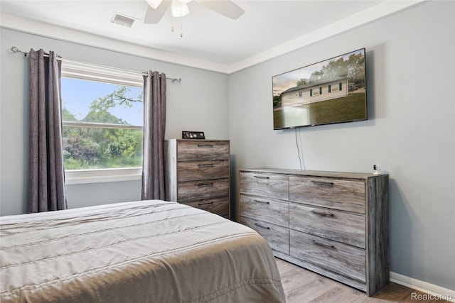 39248 Wade Rd, Taylor, MI 48174 - bedroom featuring light wood-type flooring and ceiling fan