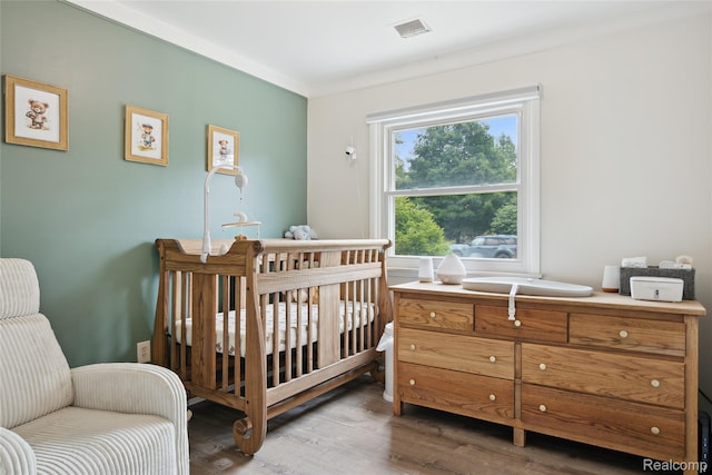 39248 Wade Rd, Taylor, MI 48174 - bedroom featuring wood finished floors