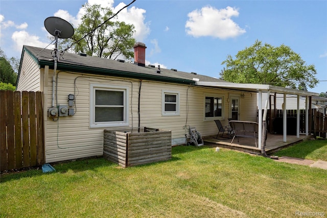39248 Wade Rd, Taylor, MI 48174 - back of house featuring a chimney