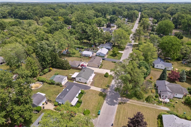 39248 Wade Rd, Taylor, MI 48174 - aerial view of property's location with nearby suburban area and a heavily wooded area