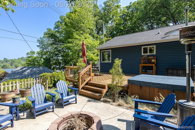 8642 Thendara Blvd, Clarkston, MI 48348 - view of patio featuring a fire pit, a hot tub, and a deck