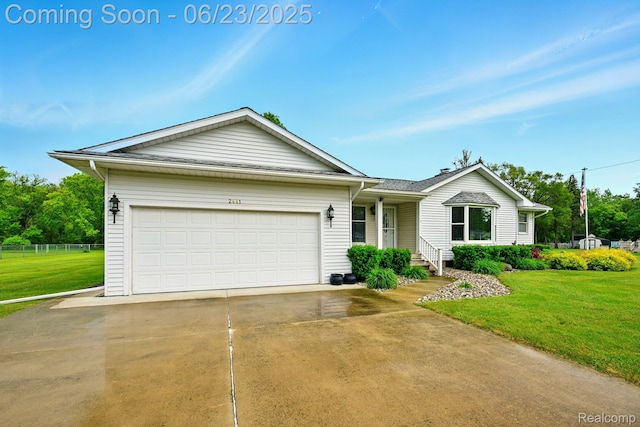 2441 Cheryl Ann Dr, Burton, MI 48519 - ranch-style house with concrete driveway and an attached garage