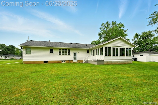 2441 Cheryl Ann Dr, Burton, MI 48519 - rear view of house with a sunroom
