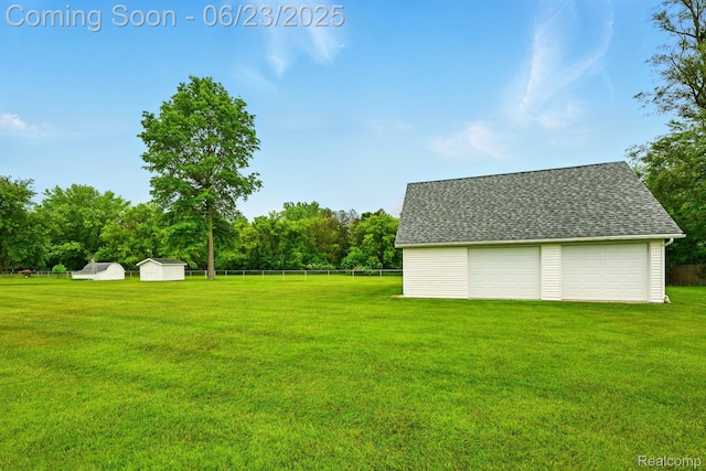 2441 Cheryl Ann Dr, Burton, MI 48519 - view of yard with an outbuilding and a garage