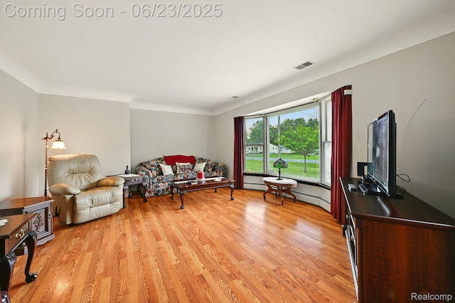 2441 Cheryl Ann Dr, Burton, MI 48519 - living room with light wood finished floors