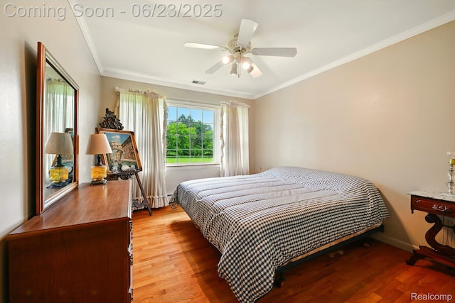 2441 Cheryl Ann Dr, Burton, MI 48519 - bedroom with wood finished floors, ornamental molding, and a ceiling fan