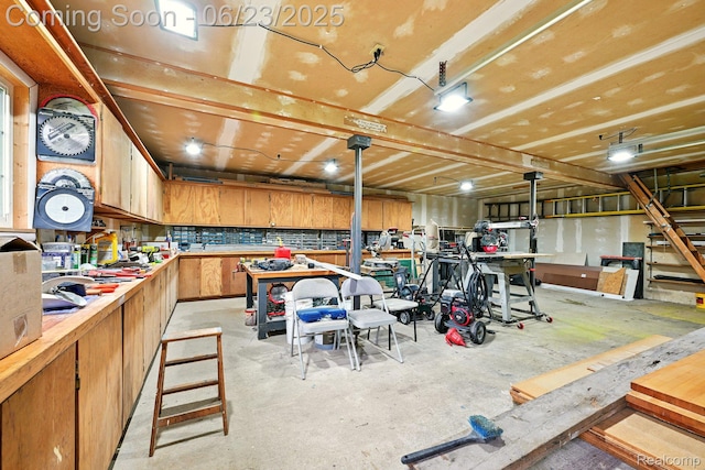 2441 Cheryl Ann Dr, Burton, MI 48519 - garage featuring a workshop area