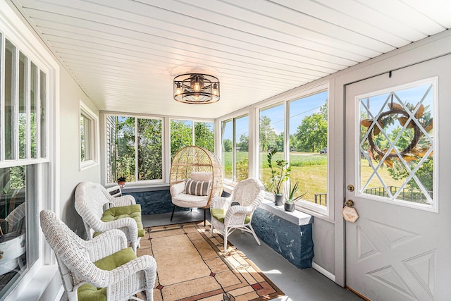 14711 White Creek Ave NE, Cedar Springs, MI 49319 - sunroom / solarium with plenty of natural light and a chandelier