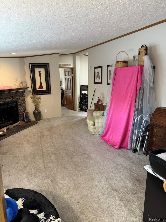 27444 Bordeau Dr, Romulus, MI 48174 - living area with a textured ceiling, ornamental molding, carpet floors, and a stone fireplace