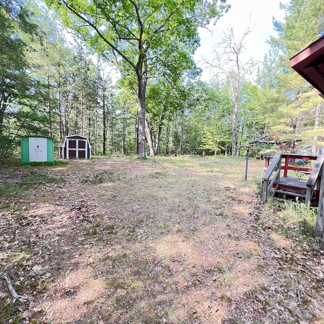 6539 Mattis Dr, Glennie, MI 48737 - view of yard with a shed